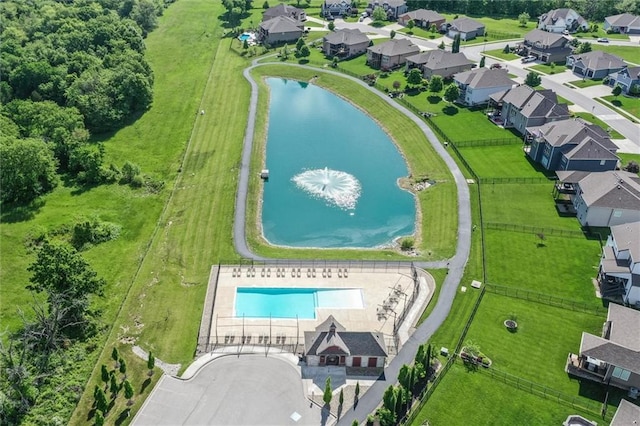 4713 NE Saratoga Ct, Lees Summit, MO 64064 - bird's eye view of a pool area and a nearby body of water