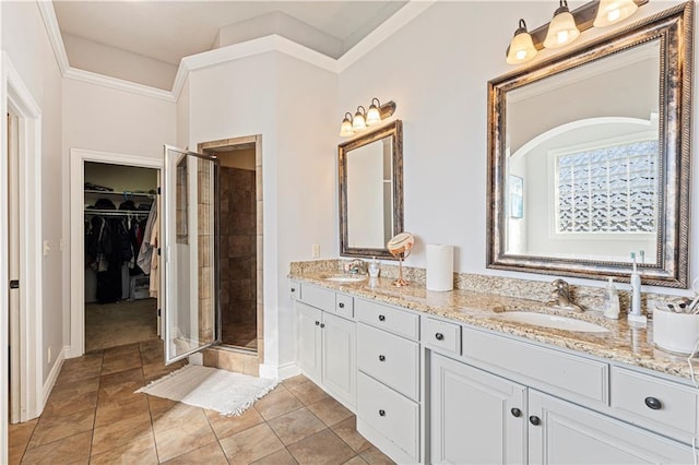 13123 W 54th Ter, Shawnee, KS 66216 - full bath with a shower stall, double vanity, a spacious closet, crown molding, and baseboards