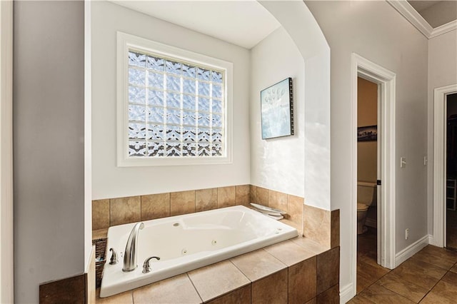 13123 W 54th Ter, Shawnee, KS 66216 - full bathroom with a tub with jets and toilet