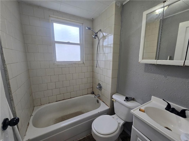117 E Buford St, Wellington, MO 64097 - bathroom featuring a textured wall, toilet, bathing tub / shower combination, and vanity