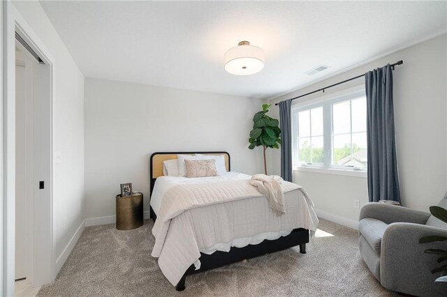 2705 NE Crestview St, Blue Springs, MO 64029 - bedroom featuring light colored carpet and baseboards