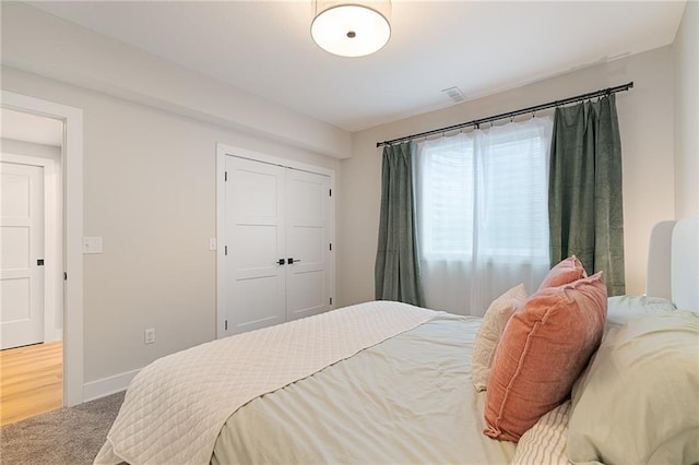 2705 NE Crestview St, Blue Springs, MO 64029 - bedroom with carpet, a closet, and baseboards