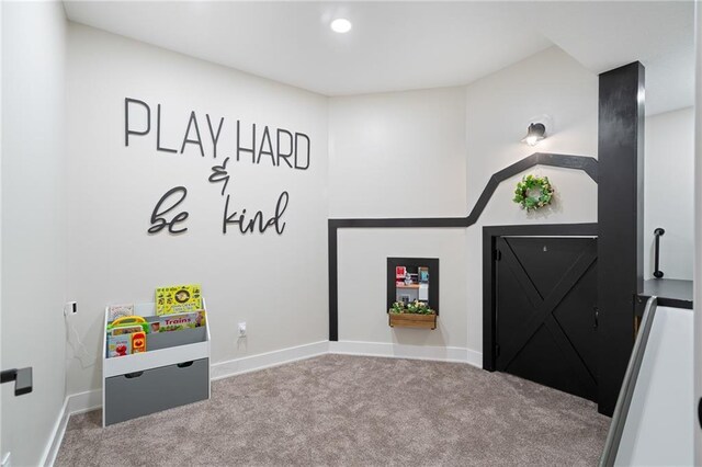 2705 NE Crestview St, Blue Springs, MO 64029 - recreation room featuring carpet floors and baseboards