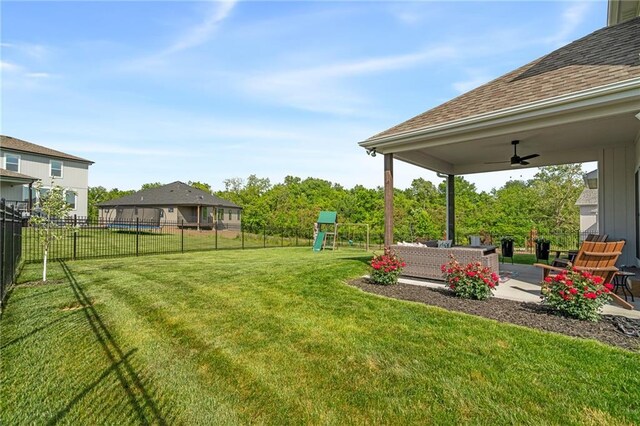2705 NE Crestview St, Blue Springs, MO 64029 - view of yard with a playground, ceiling fan, an outdoor hangout area, and a patio
