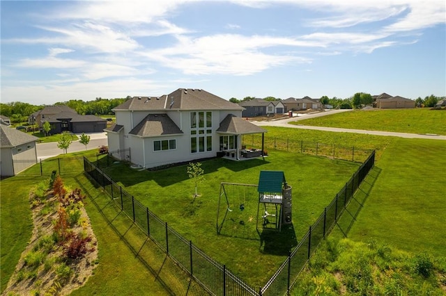 2705 NE Crestview St, Blue Springs, MO 64029 - rear view of house featuring a shingled roof and stucco siding