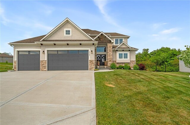 2705 NE Crestview St, Blue Springs, MO 64029 - craftsman-style home with stone siding, stucco siding, driveway, and a front yard