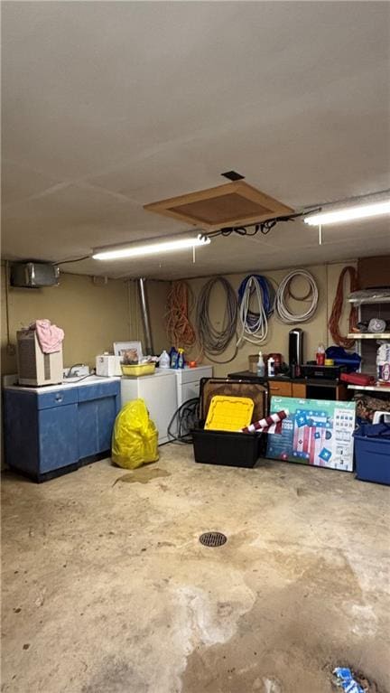 garage featuring washer and dryer