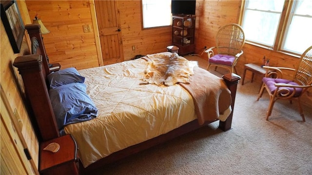 25996 Arrowhead Rd, Hermitage, MO 65668 - carpeted bedroom with multiple windows and wooden walls