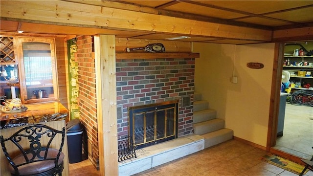 25996 Arrowhead Rd, Hermitage, MO 65668 - living area with tile patterned flooring and a brick fireplace