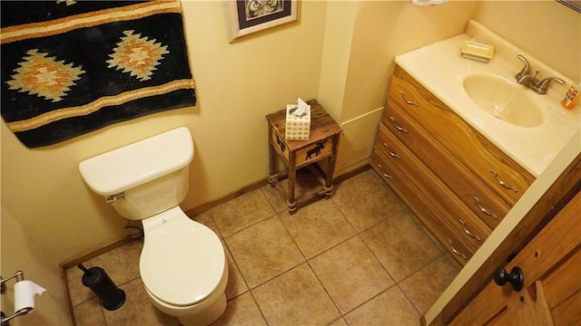 25996 Arrowhead Rd, Hermitage, MO 65668 - half bathroom with toilet, vanity, tile patterned flooring, and baseboards