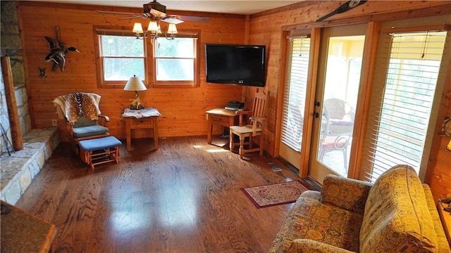 25996 Arrowhead Rd, Hermitage, MO 65668 - sitting room featuring wood finished floors, ceiling fan, and wood walls