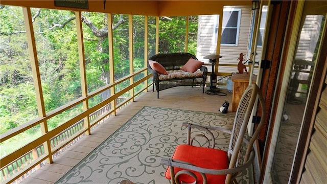 25996 Arrowhead Rd, Hermitage, MO 65668 - sunroom / solarium featuring plenty of natural light