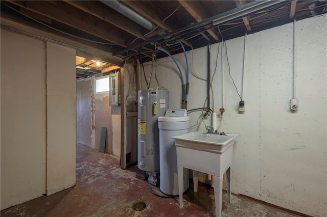 basement featuring water heater and a water softener
