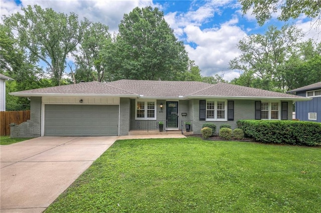 9711 Roe Ave, Overland Park, KS 66207 - view of front of home featuring an attached garage, driveway, and brick siding