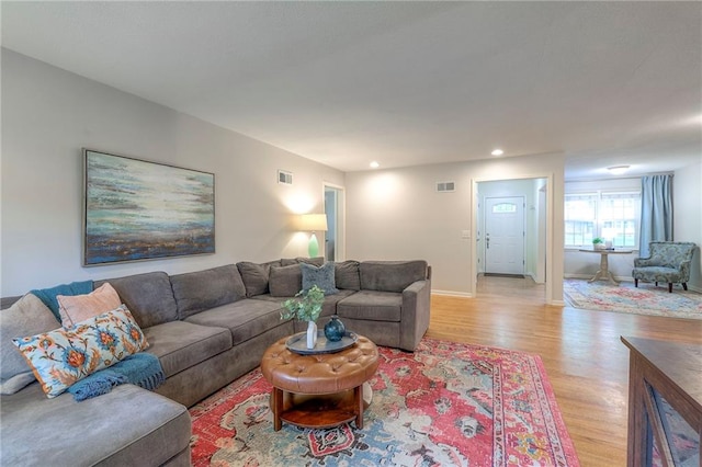 9711 Roe Ave, Overland Park, KS 66207 - living room featuring light wood-style floors and recessed lighting