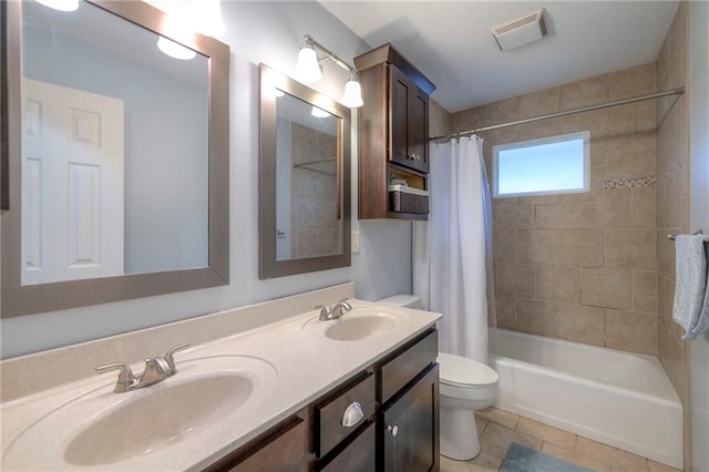 9711 Roe Ave, Overland Park, KS 66207 - bathroom featuring shower / bath combination with curtain, double vanity, and tile patterned flooring