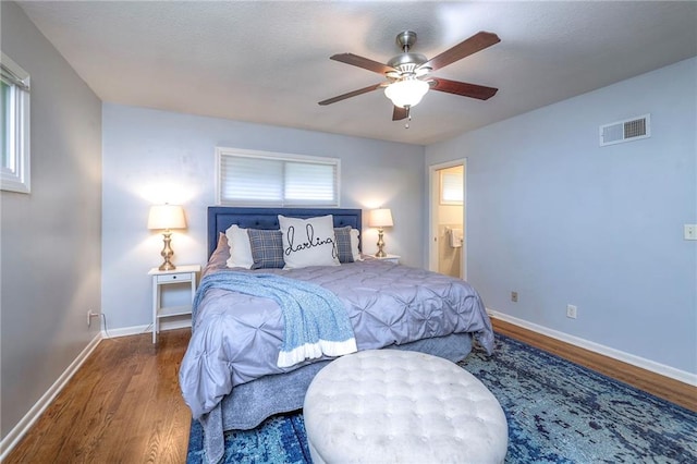 9711 Roe Ave, Overland Park, KS 66207 - bedroom featuring wood finished floors and a ceiling fan