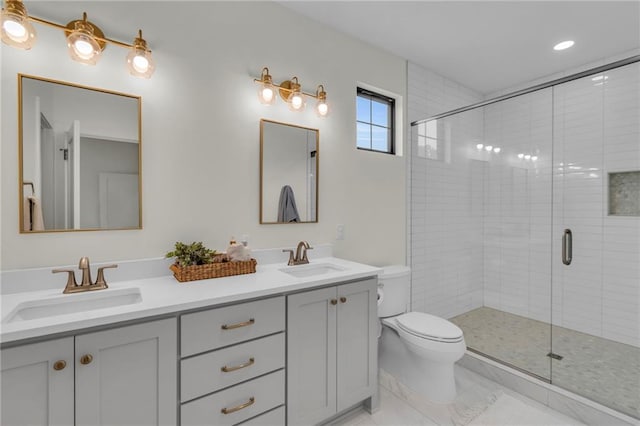 21851 179th St, Tonganoxie, KS 66086 - bathroom featuring double vanity, a shower stall, recessed lighting, and marble finish floors