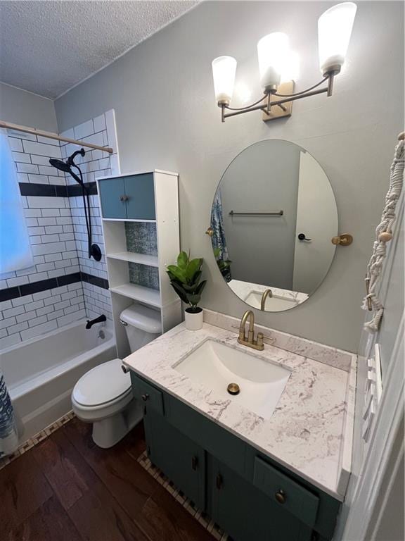 1424 S Olive St, Ottawa, KS 66067 - full bathroom with vanity, wood finished floors, a textured ceiling, shower / washtub combination, and a chandelier