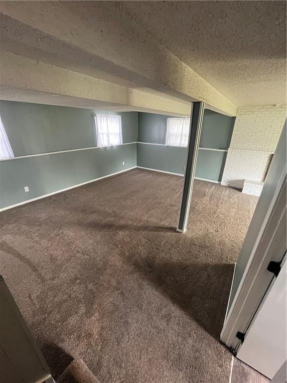 1424 S Olive St, Ottawa, KS 66067 - unfurnished bedroom with carpet floors and a textured ceiling