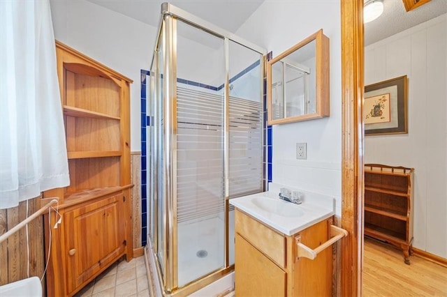 1212 E 22nd Ave, North Kansas City, MO 64116 - full bathroom featuring vanity and a shower stall