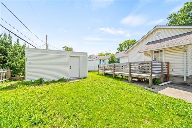 1212 E 22nd Ave, North Kansas City, MO 64116 - view of yard featuring a deck