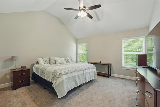 19553 E 14th St N, Independence, MO 64056 - bedroom featuring light carpet, vaulted ceiling, baseboards, and a ceiling fan