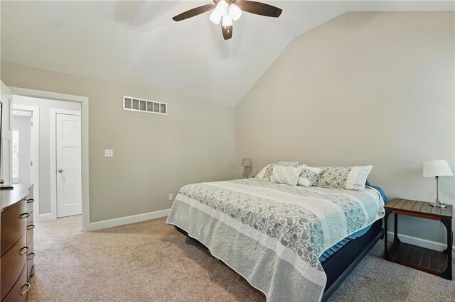 19553 E 14th St N, Independence, MO 64056 - bedroom featuring vaulted ceiling, light colored carpet, baseboards, and ceiling fan