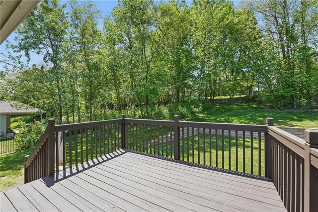19553 E 14th St N, Independence, MO 64056 - wooden terrace featuring a yard and view of scattered trees