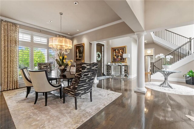 14160 Juniper St, Leawood, KS 66224 - dining room with ornate columns, stairs, wood finished floors, baseboards, and ornamental molding