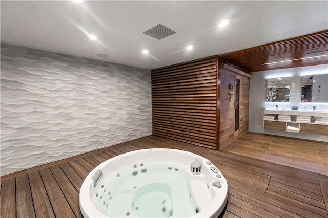 14160 Juniper St, Leawood, KS 66224 - relaxing sauna / steam room with recessed lighting and hardwood / wood-style flooring