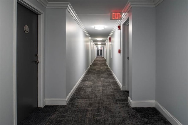 700 E 8th St Unit 10J, Kansas City, MO 64106 - hall with dark carpet, ornamental molding, and baseboards