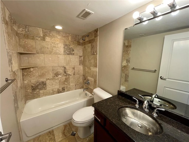 700 E 8th St Unit 10J, Kansas City, MO 64106 - full bathroom featuring toilet, bathing tub / shower combination, and vanity
