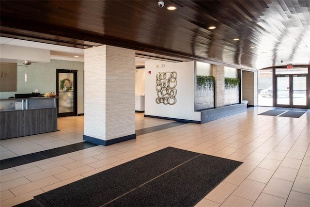 700 E 8th St Unit 10J, Kansas City, MO 64106 - community lobby featuring floor to ceiling windows and wood ceiling