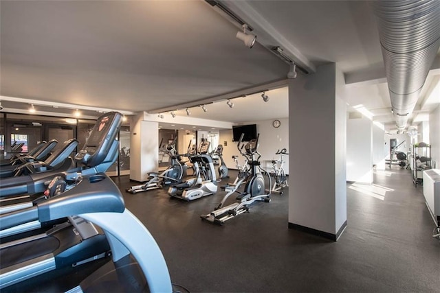 700 E 8th St Unit 10J, Kansas City, MO 64106 - workout area featuring rail lighting
