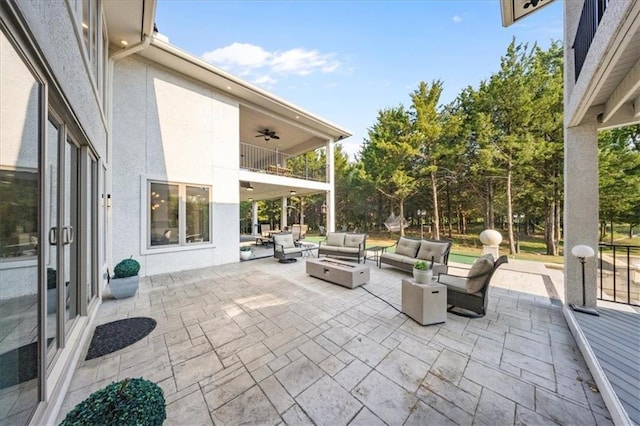 5645 Legler St, Shawnee, KS 66217 - patio / terrace with an outdoor hangout area, a ceiling fan, and a patio area
