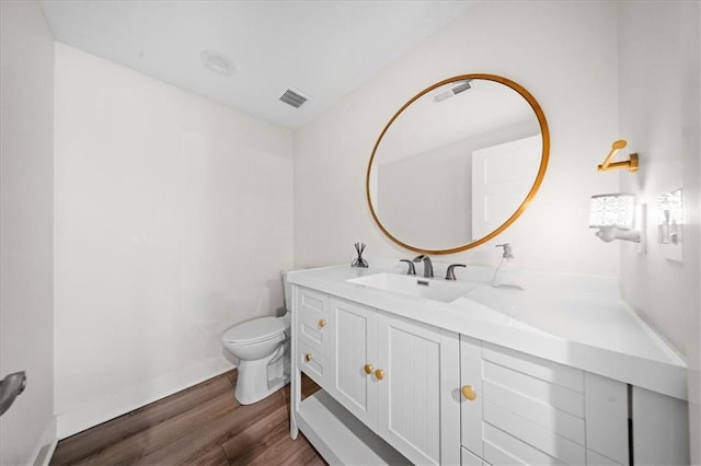 5645 Legler St, Shawnee, KS 66217 - bathroom with vanity and wood finished floors