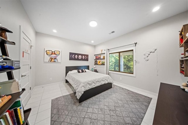 5645 Legler St, Shawnee, KS 66217 - tiled bedroom featuring recessed lighting and baseboards