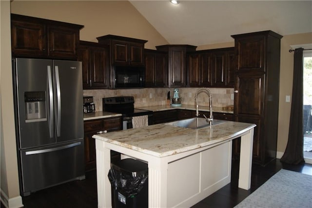 706 Terry Dr, Pleasant Hill, MO 64080 - kitchen featuring stainless steel appliances, a sink, backsplash, lofted ceiling, and dark brown cabinetry