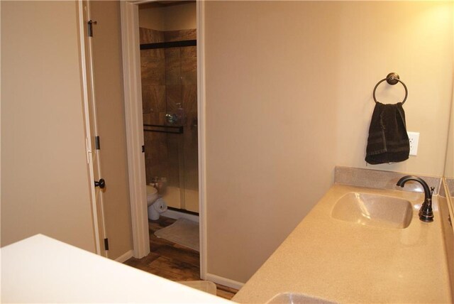 706 Terry Dr, Pleasant Hill, MO 64080 - full bath featuring a sink, a shower stall, and toilet