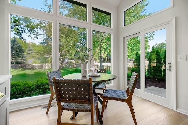 sunroom / solarium with wood finished floors