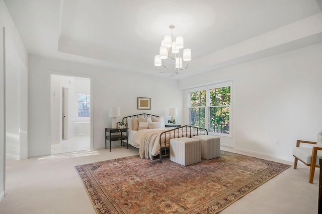 bedroom featuring carpet floors, multiple windows, a chandelier, and a raised ceiling