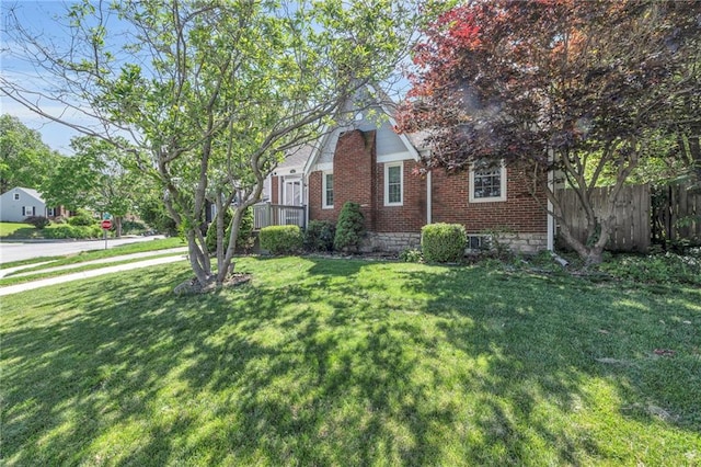 7126 Charlotte St, Kansas City, MO 64131 - obstructed view of property with brick siding