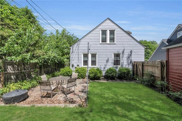 7126 Charlotte St, Kansas City, MO 64131 - back of property featuring a patio