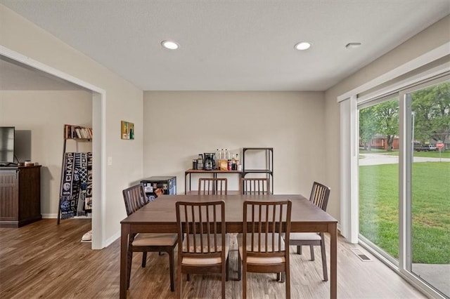 4700 E 136th Ct, Grandview, MO 64030 - dining area with light wood-style floors, recessed lighting, and baseboards