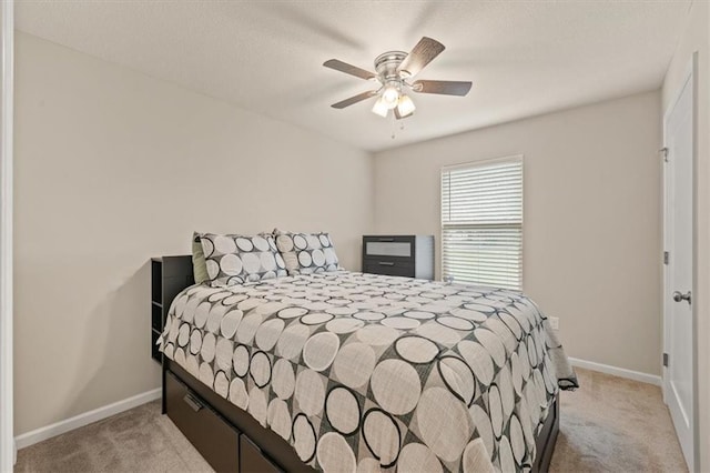 4700 E 136th Ct, Grandview, MO 64030 - carpeted bedroom featuring baseboards and a ceiling fan
