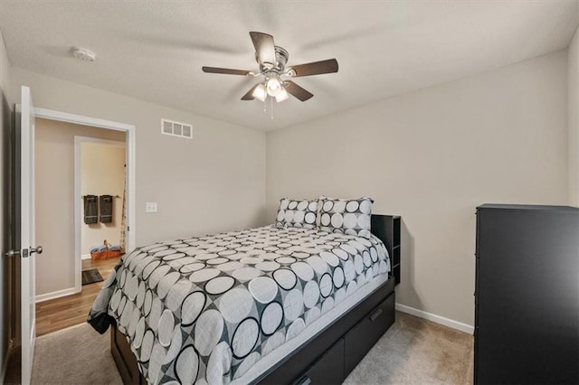 4700 E 136th Ct, Grandview, MO 64030 - bedroom featuring carpet flooring, baseboards, and a ceiling fan