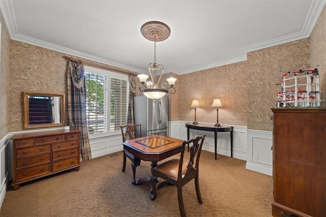 5817 W 147th Pl, Overland Park, KS 66223 - dining space with ornamental molding, wallpapered walls, carpet flooring, and a chandelier