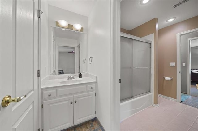 5817 W 147th Pl, Overland Park, KS 66223 - ensuite bathroom with vanity, baseboards, enclosed tub / shower combo, and recessed lighting