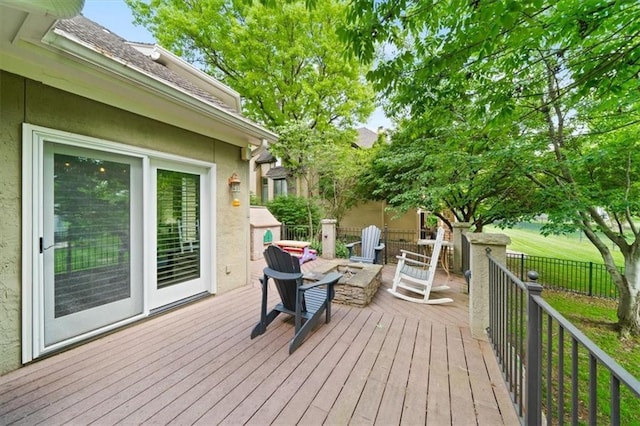 5817 W 147th Pl, Overland Park, KS 66223 - deck featuring an outdoor fire pit and fence